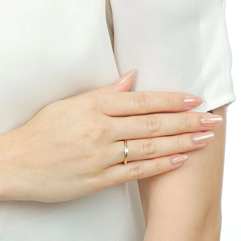 Joias Minimalistas 2026: elegância atemporal que define o estilo do dia a dia 3 joias minimalistas 2026 Anel Solitario de Ouro 18K com Zirconia AN19150 2