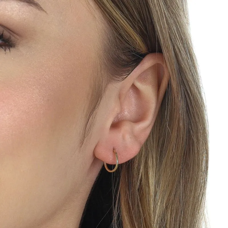 Joias Minimalistas 2026: elegância atemporal que define o estilo do dia a dia 10 joias minimalistas 2026 Brinco de Ouro 10K Argola Redonda Fio Quadrado Liso BR19925 2