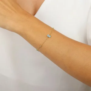Pulseira de Ouro 18K Malha Portuguesa 18cm com Baguetes Topazio Sky e Redondos Topazio Swiss Naturais PS23571 1